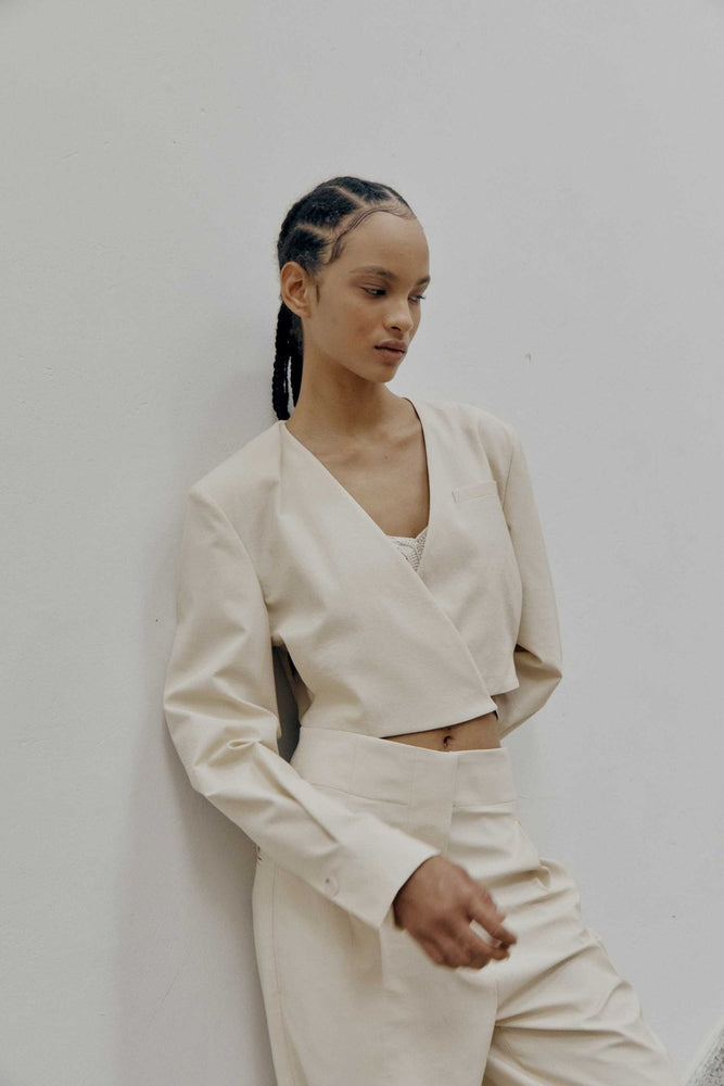 
            
                Load image into Gallery viewer, Criss Cross Cropped Jacket in White
            
        